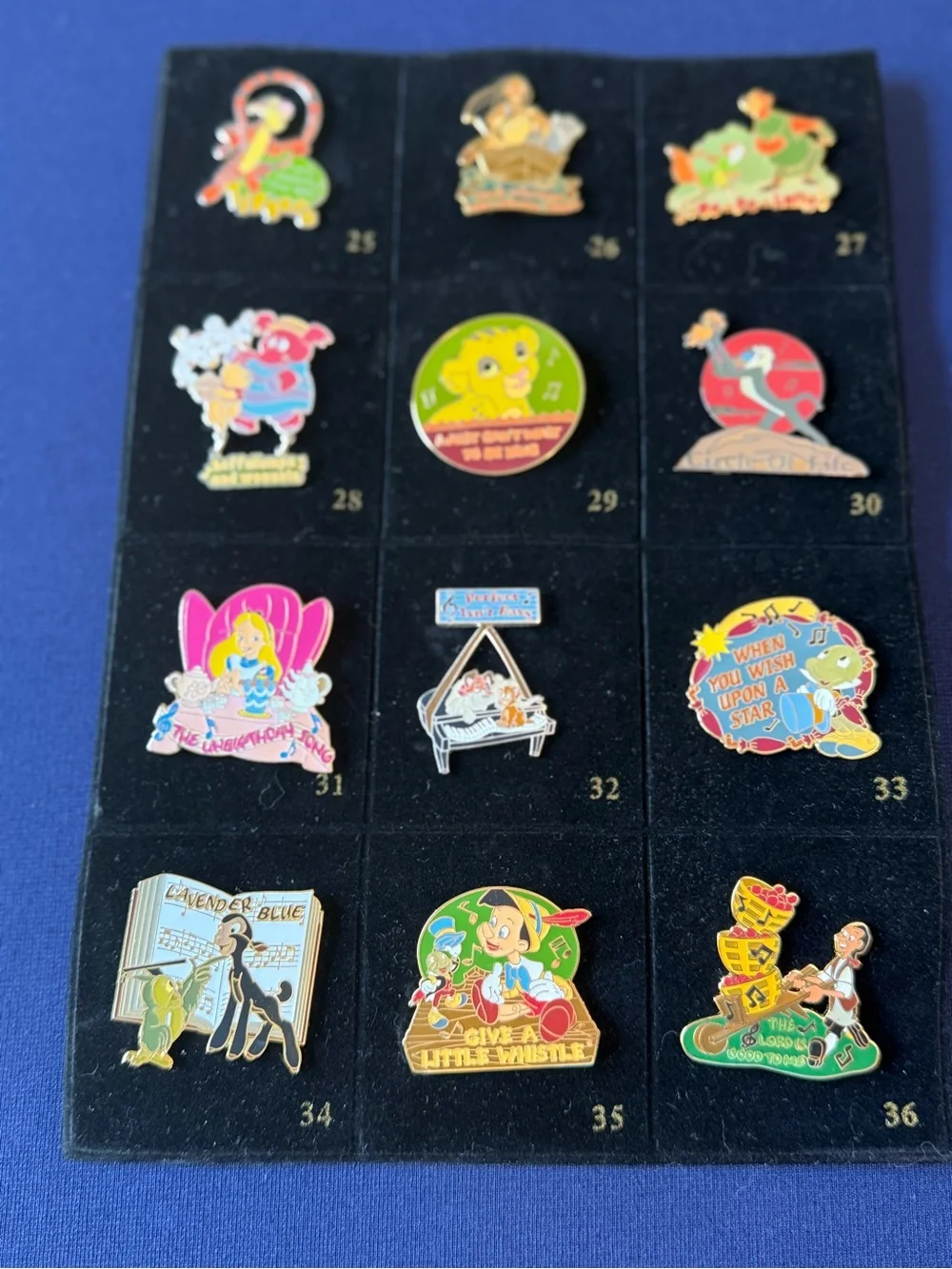 Disney Store 2002 Magical Musical Moments 12 pins Pooh Alice Lion King
